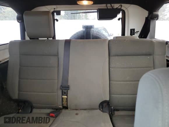 2007 Jeep Wrangler Unlimited Sahara z VIN 1J4GA59187L104520, wystawiony jako Copart lot #86331095 z przebiegiem 213 087 mil mil oraz Czysty tytuł • Clean title. Historia ofert i sprzedaży dostępna na DreamBid. Obrazek 10.