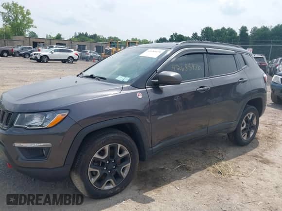 2018 Jeep Compass Trailhawk z VIN 3C4NJDDBXJT198919, wystawiony jako IAAI lot #42685470 z przebiegiem 139 764 mil mil oraz . Historia ofert i sprzedaży dostępna na DreamBid. Obrazek 18.