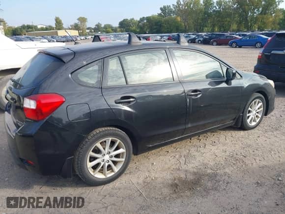 2013 Subaru Impreza Premium with VIN JF1GPAC60D2891553, listed as a IAAI auction lot 43351582 with 201,173 mi miles and . Bid and sale history available at DreamBid. Image 4.