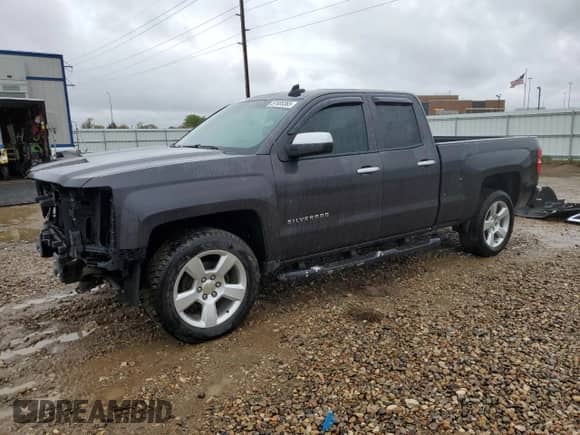 2015 Chevrolet Silverado 1500 Work Truck with VIN 1GCRCPEC5FZ429584, listed as a Copart auction lot 57485365 with 100,671 mi miles and Salvage title. Bid and sale history available at DreamBid. Image 1.