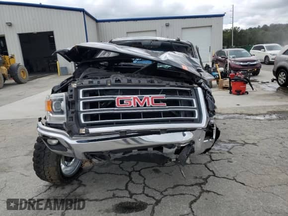 2015 GMC Sierra 1500 SLT z VIN 3GTP1VECXFG427296, wystawiony jako Copart lot #84735585 z przebiegiem Nie podano mil oraz Nie do naprawy • Non repairable. Historia ofert i sprzedaży dostępna na DreamBid. Obrazek 5.