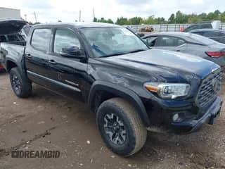 2023 Toyota Tacoma SR z VIN 3TYCZ5AN7PT173052, wystawiony jako IAAI lot #43304309 z przebiegiem 29 946 mil mil oraz . Historia ofert i sprzedaży dostępna na DreamBid. Obrazek 1.