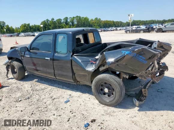 1997 Toyota Tacoma z VIN 4TAVL52N6VZ319081, wystawiony jako Copart lot #71695955 z przebiegiem 262 304 mil mil oraz Szkoda całkowita • Salvage title. Historia ofert i sprzedaży dostępna na DreamBid. Obrazek 2.