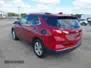 2020 Chevrolet Equinox Premier with VIN 3GNAXNEV0LS620806, listed as a IAAI auction lot 43315873 with 85,479 mi miles and . Bid and sale history available at DreamBid. Image 3.