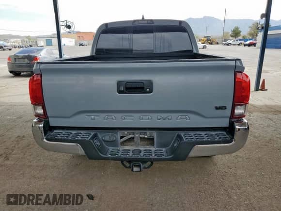 2019 Toyota Tacoma SR with VIN 3TMCZ5ANXKM271710, listed as a Copart auction lot 80954785 with 113,567 mi miles and Salvage title. Bid and sale history available at DreamBid. Image 6.