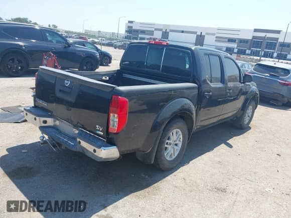 2018 Nissan Frontier SV with VIN 1N6DD0ER6JN701415, listed as a IAAI auction lot 43145718 with 164,798 mi miles and . Bid and sale history available at DreamBid. Image 4.