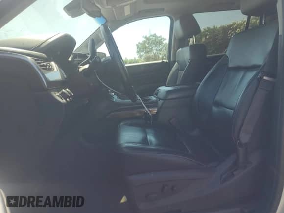 2015 Chevrolet Suburban LT with VIN 1GNSKJKC4FR739657, listed as a Copart auction lot 70586615 with 116,344 mi miles and Salvage title. Bid and sale history available at DreamBid. Image 7.