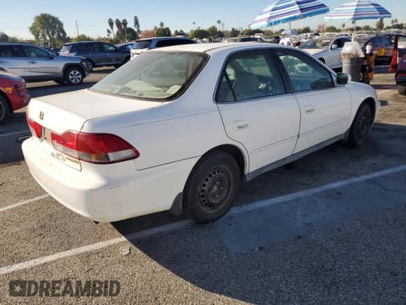 2002 Honda Accord LX с VIN 1HGCG655X2A076954, выставлен на аукционе Copart как лот 81845354 с пробегом Не указан миль и Списание • Salvage title. История ставок и продаж доступна на DreamBid. Изображение 3.