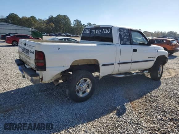 1999 Dodge 2500 with VIN 1B7KF23Z6XJ558288, listed as a Copart auction lot 86252004 with 251,023 mi miles and Salvage title. Bid and sale history available at DreamBid. Image 3.