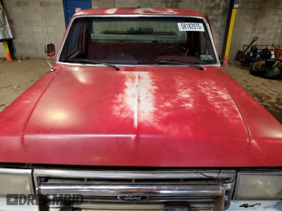 1988 Ford F-150 with VIN 1FTEF14Y6JNA06982, listed as a Copart auction lot 58182975 with 72,492 mi miles and Salvage title. Bid and sale history available at DreamBid. Image 11.