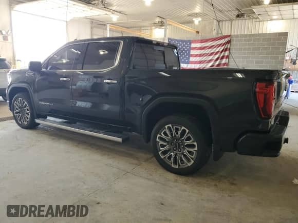 2024 GMC Sierra 1500 Denali Ultimate with VIN 1GTUUHEL3RZ158154, listed as a Copart auction lot 60102395 with 31,348 mi miles and Salvage title. Bid and sale history available at DreamBid. Image 2.