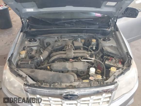 2013 Subaru Forester X z VIN JF2SHABC6DG424991, wystawiony jako IAAI lot #41638591 z przebiegiem 152 047 mil mil oraz . Historia ofert i sprzedaży dostępna na DreamBid. Obrazek 10.