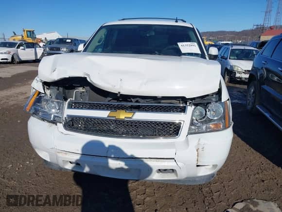 2013 Chevrolet Tahoe LS with VIN 1GNSKAE06DR187867, listed as a IAAI auction lot 41352892 with 110,116 mi miles and . Bid and sale history available at DreamBid. Image 6.