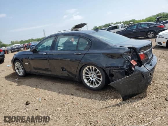 2015 BMW 7 Series 750Li xDrive с VIN WBAYF8C50FD655054, выставлен на аукционе Copart как лот 65569805 с пробегом 110 081 миль миль и Списание • Salvage title. История ставок и продаж доступна на DreamBid. Изображение 2.