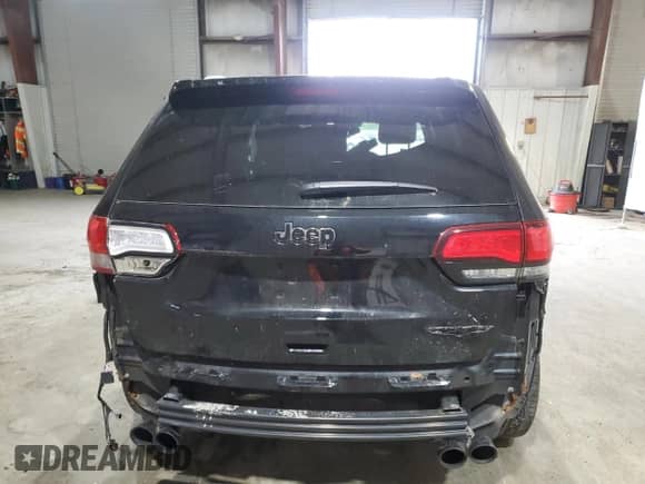 2018 Jeep Grand Cherokee Trackhawk z VIN 1C4RJFN90JC459012, wystawiony jako Copart lot #51015935 z przebiegiem 9 096 mil mil oraz Szkoda całkowita • Salvage title. Historia ofert i sprzedaży dostępna na DreamBid. Obrazek 6.