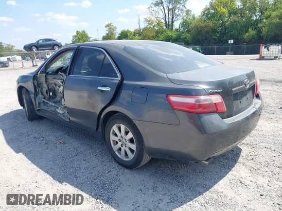 2007 Toyota Camry XLE with VIN 4T1BK46K87U538012, listed as a IAAI auction lot 43172573 with 165,196 mi miles and . Bid and sale history available at DreamBid. Image 3.