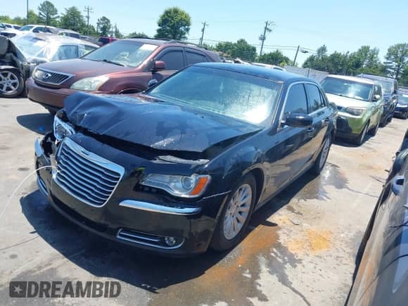 2013 Chrysler 300 with VIN 2C3CCAAG5DH508539, listed as a IAAI auction lot 42557370 with 209,421 mi miles and . Bid and sale history available at DreamBid. Image 18.