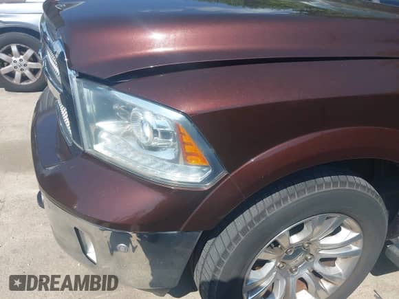 2014 Ram 1500 Longhorn z VIN 1C6RR7PT5ES451661, wystawiony jako IAAI lot #42939709 z przebiegiem 138 865 mil mil oraz . Historia ofert i sprzedaży dostępna na DreamBid. Obrazek 6.