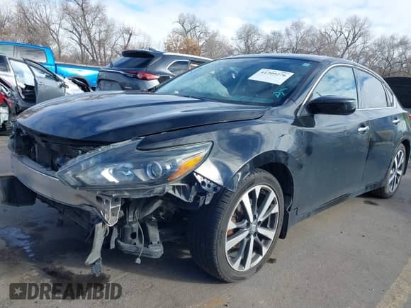 2016 Nissan Altima S z VIN 1N4AL3AP1GC254291, wystawiony jako IAAI lot #41209276 z przebiegiem Nie podano mil oraz . Historia ofert i sprzedaży dostępna na DreamBid. Obrazek 16.