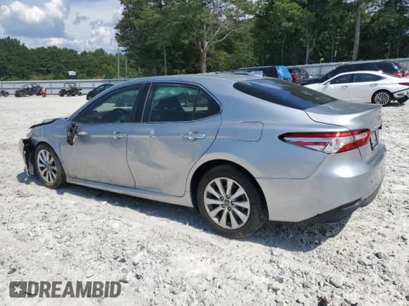 2019 Toyota Camry LE с VIN 4T1B11HKXKU193153, выставлен на аукционе Copart как лот 66660725 с пробегом 130 057 миль миль и Списание • Salvage title. История ставок и продаж доступна на DreamBid. Изображение 2.