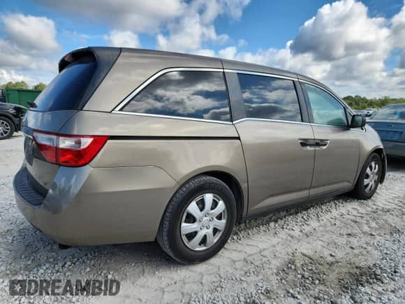 2013 Honda Odyssey LX z VIN 5FNRL5H21DB047448, wystawiony jako Copart lot #85334295 z przebiegiem 193 092 mil mil oraz Szkoda całkowita • Salvage title. Historia ofert i sprzedaży dostępna na DreamBid. Obrazek 3.