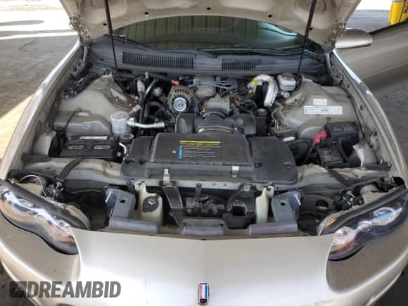 2002 Chevrolet Camaro z VIN 2G1FP22K122166392, wystawiony jako Copart lot #81585385 z przebiegiem 142 131 mil mil oraz Szkoda całkowita • Salvage title. Historia ofert i sprzedaży dostępna na DreamBid. Obrazek 11.