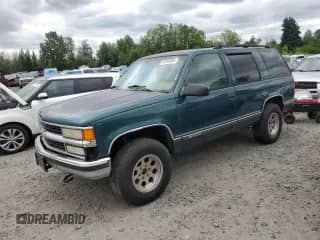1997 Chevrolet Tahoe с VIN 1GNEK13R6VJ340522, выставлен на аукционе Copart как лот 62493055 с пробегом 266 579 миль миль и Списание • Salvage title. История ставок и продаж доступна на DreamBid. Изображение 1.