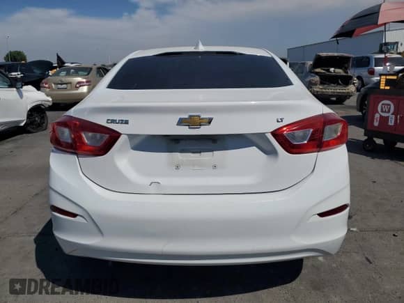 2018 Chevrolet Cruze LT with VIN 1G1BE5SMXJ7181035, listed as a Copart auction lot 70885385 with 115,122 mi miles and Salvage title. Bid and sale history available at DreamBid. Image 6.