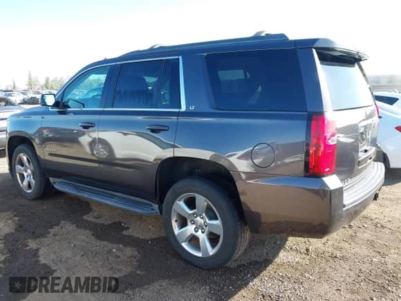 2017 Chevrolet Tahoe LT with VIN 1GNSKBKC0HR268910, listed as a IAAI auction lot 43566744 with 126,040 mi miles and . Bid and sale history available at DreamBid. Image 3.