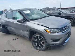 2018 Jeep Compass Limited with VIN 3C4NJCCBXJT499864, listed as a IAAI auction lot 42319832 with 94,893 mi miles and . Bid and sale history available at DreamBid. Image 1.