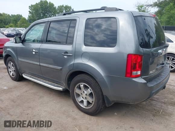 2009 Honda Pilot Touring with VIN 5FNYF48969B031280, listed as a IAAI auction lot 42934690 with 163,844 mi miles and . Bid and sale history available at DreamBid. Image 3.
