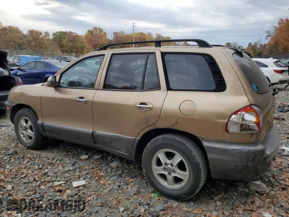 2001 Hyundai Santa Fe GLS с VIN KM8SC83D71U084837, выставлен на аукционе Copart как лот 77588984 с пробегом 102 585 миль миль и Списание • Salvage title. История ставок и продаж доступна на DreamBid. Изображение 2.