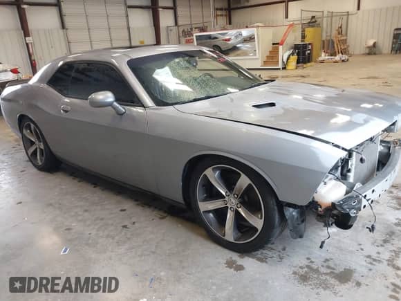 2014 Dodge Challenger R/T с VIN 2C3CDYBT5EH299046, выставлен на аукционе IAAI как лот 41330322 с пробегом 131 738 миль миль и . История ставок и продаж доступна на DreamBid. Изображение 1.