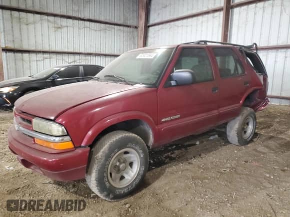 2003 Chevrolet Blazer LS с VIN 1GNCS13X03K151216, выставлен на аукционе Copart как лот 82921564 с пробегом Не указан миль и Списание • Salvage title. История ставок и продаж доступна на DreamBid. Изображение 1.