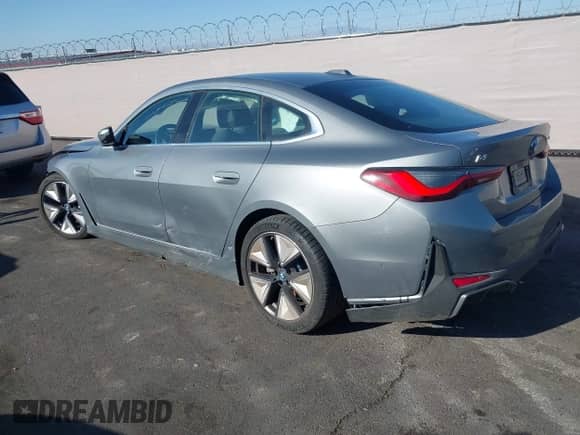 2023 BMW i4 eDrive40 with VIN WBY73AW03PFP69875, listed as a IAAI auction lot 43344822 with 9,264 mi miles and . Bid and sale history available at DreamBid. Image 3.