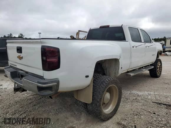 2015 Chevrolet Silverado 3500 с VIN 1GC4CYCGXFF634874, выставлен на аукционе Copart как лот 69923284 с пробегом 135 462 миль миль и Списание • Salvage title. История ставок и продаж доступна на DreamBid. Изображение 3.