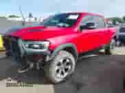 2022 Ram 1500 Rebel z VIN 1C6SRFLT9NN307014, wystawiony jako IAAI lot #41680604 z przebiegiem 45 214 mil mil oraz . Historia ofert i sprzedaży dostępna na DreamBid. Obrazek 2.