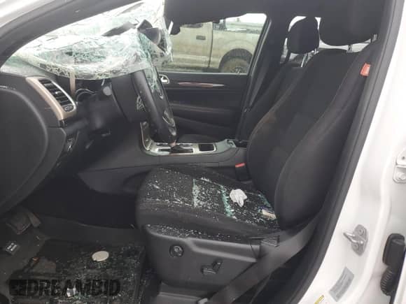 2016 Jeep Grand Cherokee 75th Anniversary with VIN 1C4RJEAG5GC457697, listed as a Copart auction lot 61092745 with 141,488 mi miles and Salvage title. Bid and sale history available at DreamBid. Image 7.