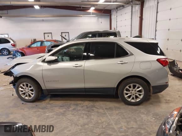 2018 Chevrolet Equinox LT z VIN 2GNAXSEVXJ6352812, wystawiony jako IAAI lot #43168373 z przebiegiem 128 214 mil mil oraz . Historia ofert i sprzedaży dostępna na DreamBid. Obrazek 14.