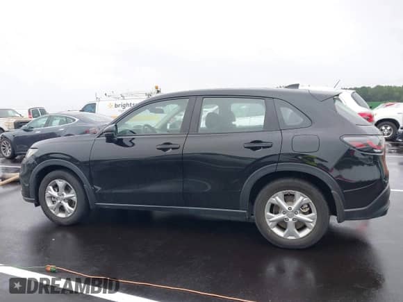 2025 Honda HR-V LX с VIN 3CZRZ1H35SM700978, выставлен на аукционе IAAI как лот 42939198 с пробегом 50 002 миль миль и . История ставок и продаж доступна на DreamBid. Изображение 14.