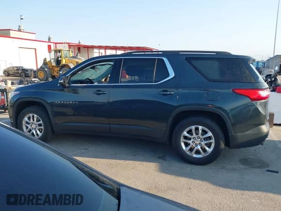 2021 Chevrolet Traverse LT Cloth z VIN 1GNERGKW2MJ169045, wystawiony jako IAAI lot #42935055 z przebiegiem 64 272 mil mil oraz . Historia ofert i sprzedaży dostępna na DreamBid. Obrazek 14.