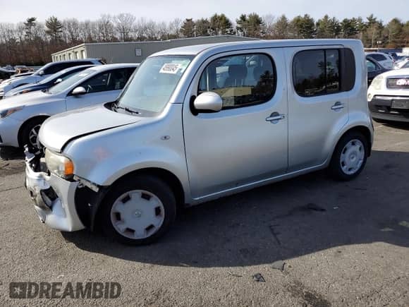 2013 Nissan Cube S with VIN JN8AZ2KR6DT301852, listed as a Copart auction lot 48990045 with 94,920 mi miles and Salvage title. Bid and sale history available at DreamBid. Image 1.