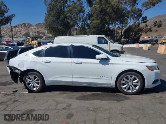 2017 Chevrolet Impala LT z VIN 2G1105SA0H9121807, wystawiony jako IAAI lot #42899666 z przebiegiem 67 942 mil mil oraz . Historia ofert i sprzedaży dostępna na DreamBid. Obrazek 13.