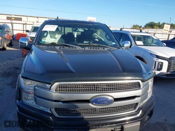 2018 Ford F-150 XL z VIN 1FTEW1C57JFC99955, wystawiony jako IAAI lot #41217007 z przebiegiem 176 723 mil mil oraz . Historia ofert i sprzedaży dostępna na DreamBid. Obrazek 12.