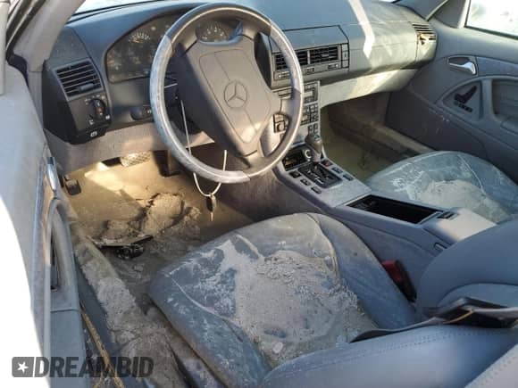 1997 Mercedes-Benz SL 500 с VIN WDBFA63F1VF152883, выставлен на аукционе Copart как лот 77570524 с пробегом Не указан миль и Списание • Salvage title. История ставок и продаж доступна на DreamBid. Изображение 8.