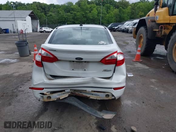 2016 Ford Fiesta S with VIN 3FADP4AJ2GM148806, listed as a IAAI auction lot 42336301 with 123,209 mi miles and . Bid and sale history available at DreamBid. Image 16.