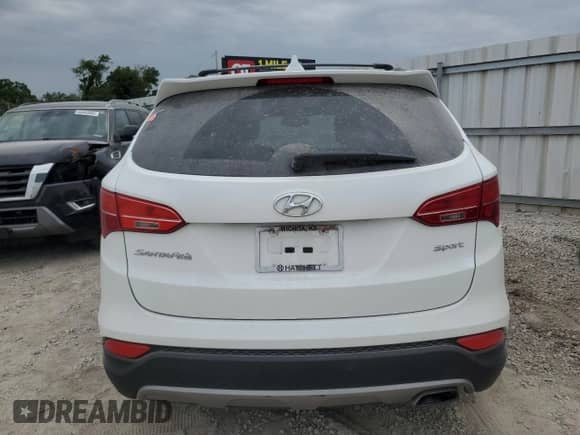 2013 Hyundai Santa Fe Sport z VIN 5XYZU3LBXDG114775, wystawiony jako Copart lot #58007985 z przebiegiem 124 807 mil mil oraz Szkoda całkowita • Salvage title. Historia ofert i sprzedaży dostępna na DreamBid. Obrazek 6.