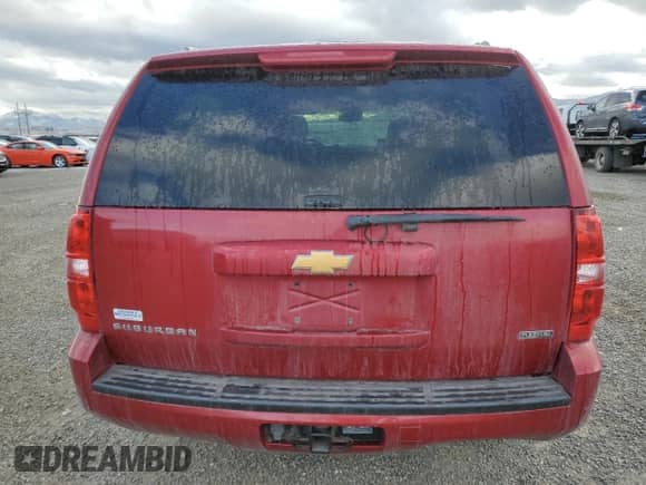 2012 Chevrolet Suburban LS with VIN 1GNSKHE74CR325944, listed as a Copart auction lot 81395844 with 87,814 mi miles and Salvage title. Bid and sale history available at DreamBid. Image 6.