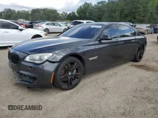 2014 BMW 7 Series 740Li с VIN WBAYE4C52ED137991, выставлен на аукционе Copart как лот 54702135 с пробегом 145 375 миль миль и Списание • Salvage title. История ставок и продаж доступна на DreamBid. Изображение 1.