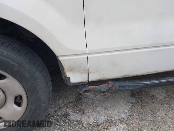 2009 Ford F-150 XL с VIN 1FTRF12839KA68521, выставлен на аукционе IAAI как лот 41307002 с пробегом 191 999 миль миль и . История ставок и продаж доступна на DreamBid. Изображение 13.